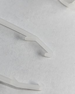 Precision plastic drywall pry tool for lighting installation.