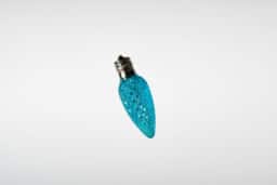 Colorful LED holiday light bulb for festive lighting decoration.