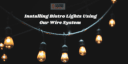 A bistro light system using wire to avoid sagging lights.
