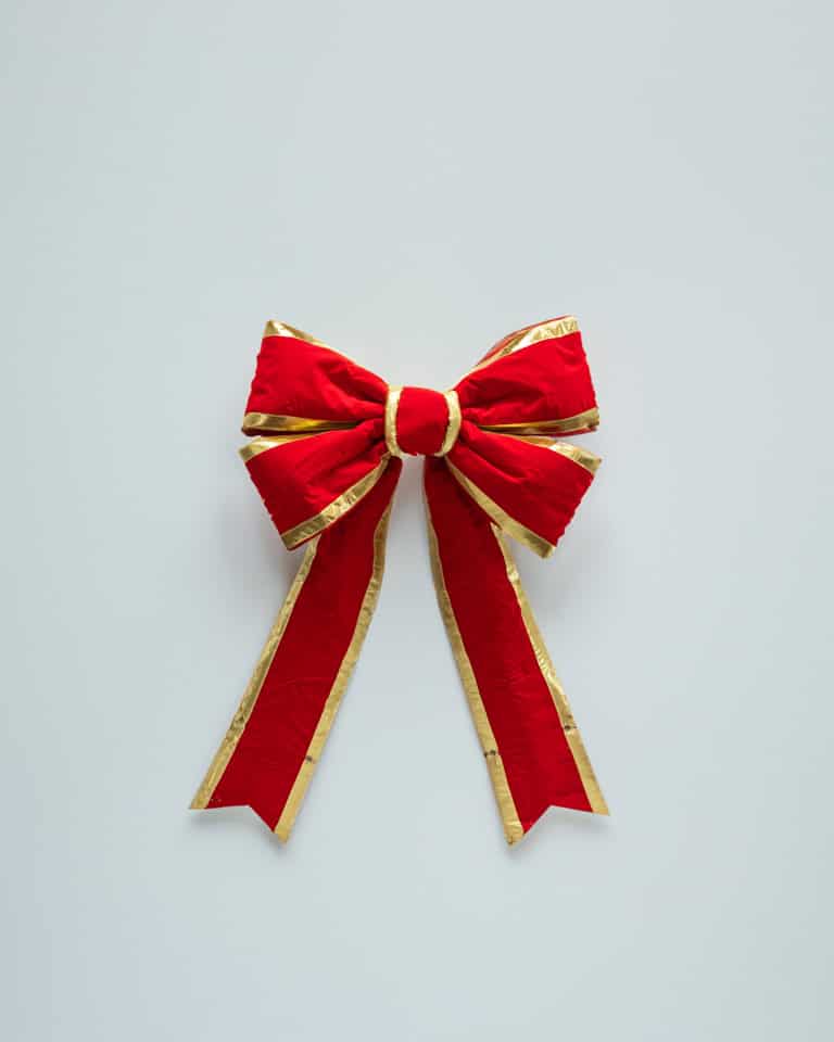 wfhppzzkdon51gzcbq1b4yey-large.jpg Red Bow w/ Gold Trim - Image 1