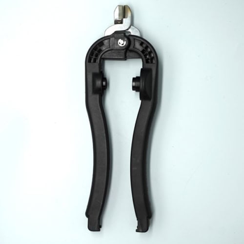 Heavy-duty clamp with locking mechanism for industrial lighting installation.